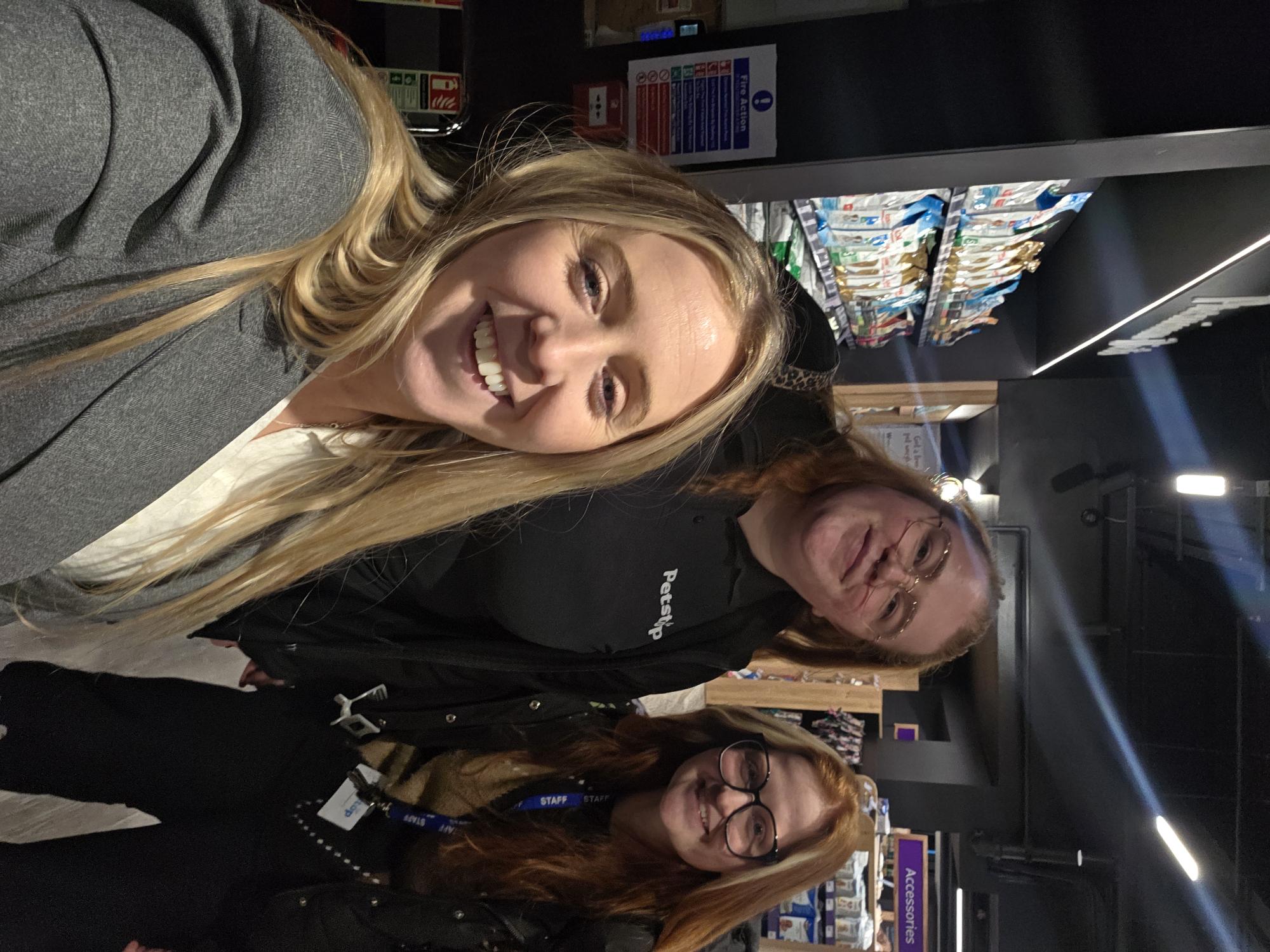 Louise Lally with two Petstop staff members on the shopfloor